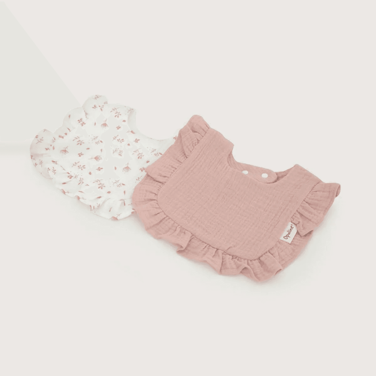 Baberos (tonos de referencia beige, rosados palos, etc)